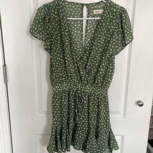 Green and white spotted boutique romper. Size small